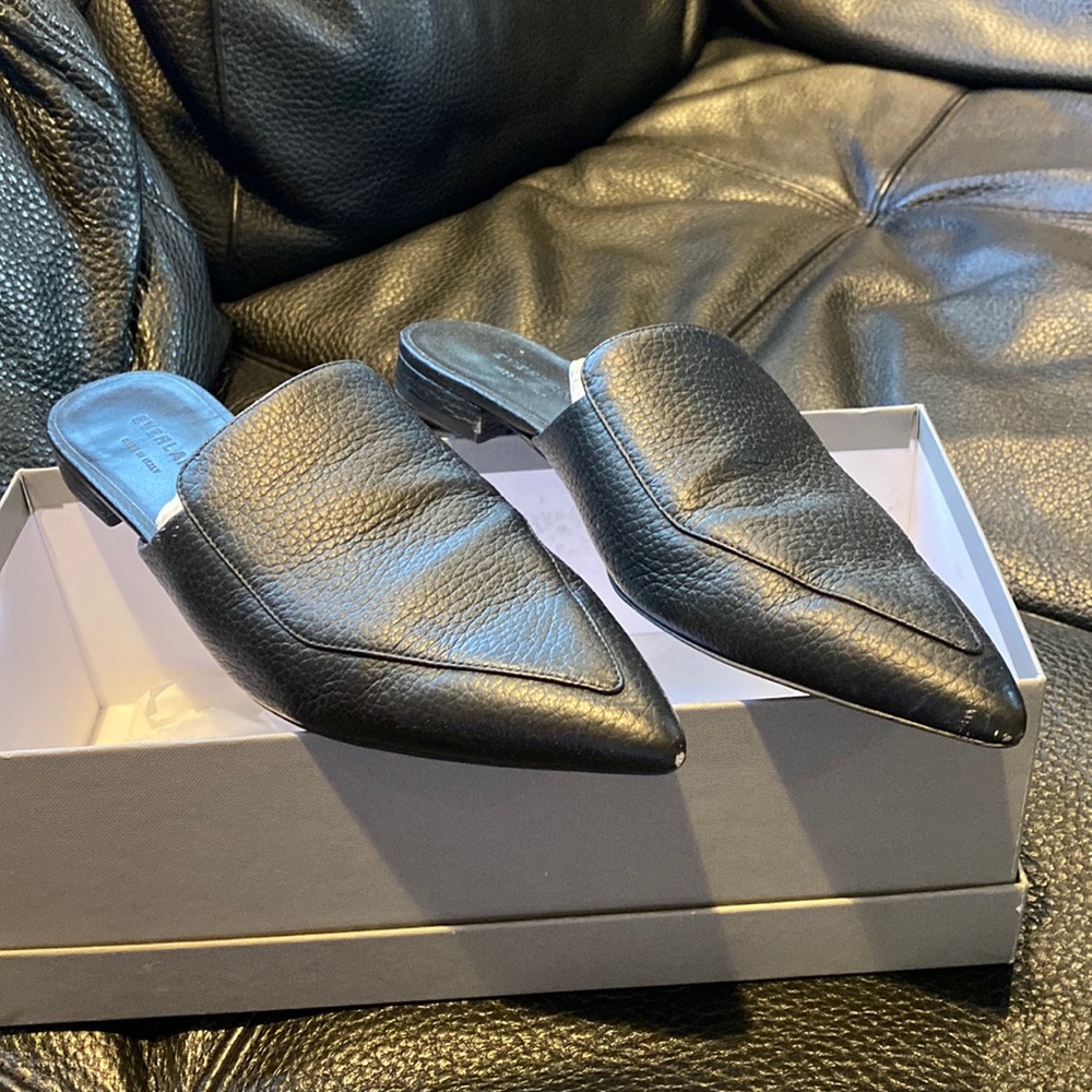 Everlane black faux leather slides.